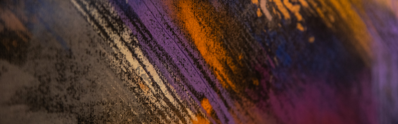 Fragment of an abstract picture. On a black background, diagonal lines made with pastel crayons. Very colorful.