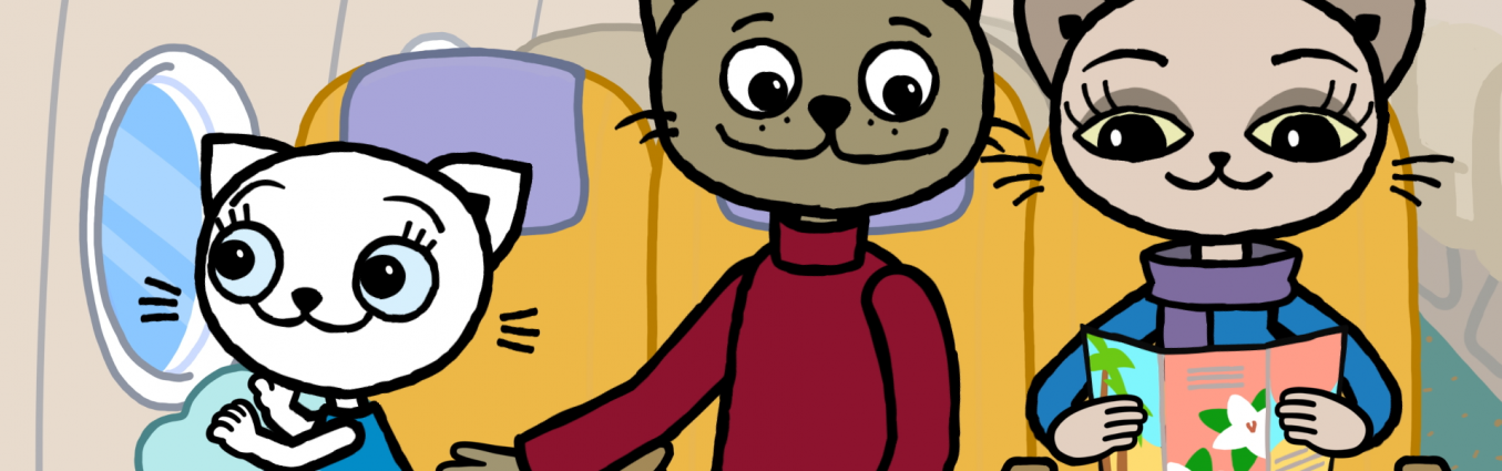 trzy koty podróżujące w samolocie