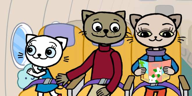 trzy koty podróżujące w samolocie